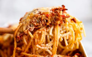 slice of spaghetti bake scooped out of casserole dish