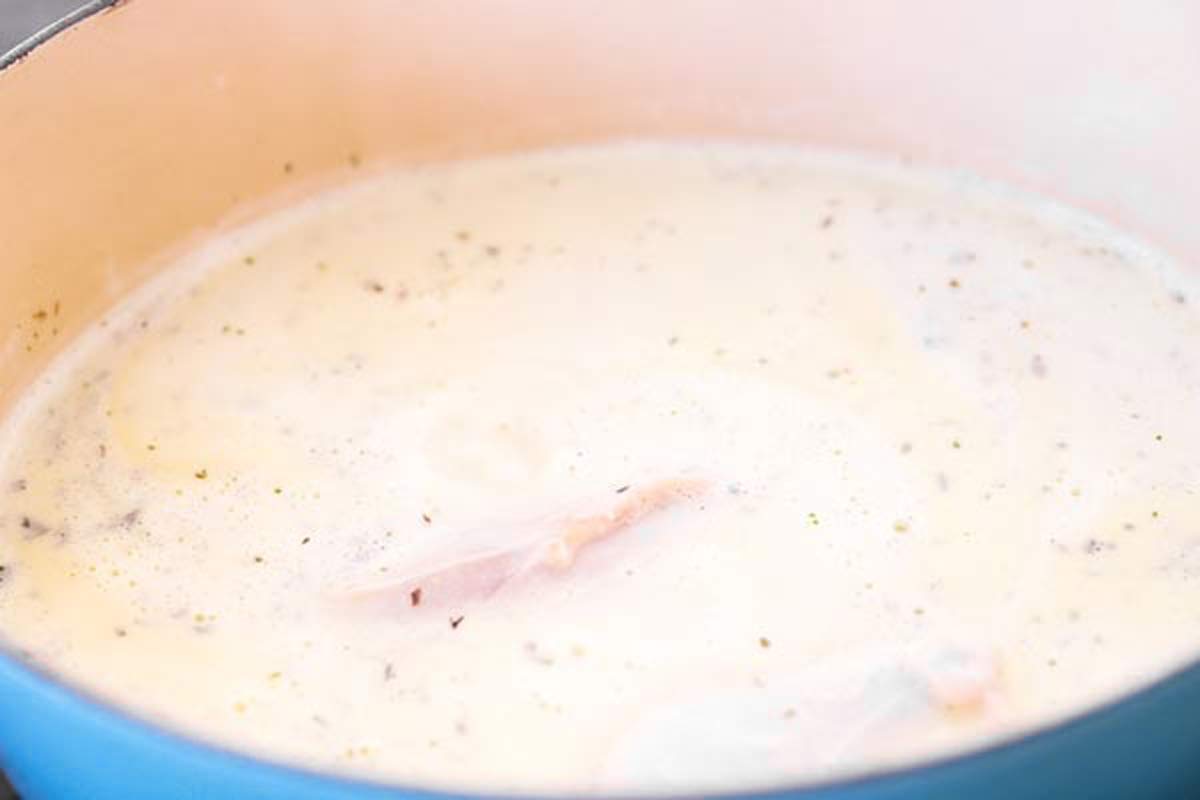 ingredients for chicken noodle soup in Dutch oven