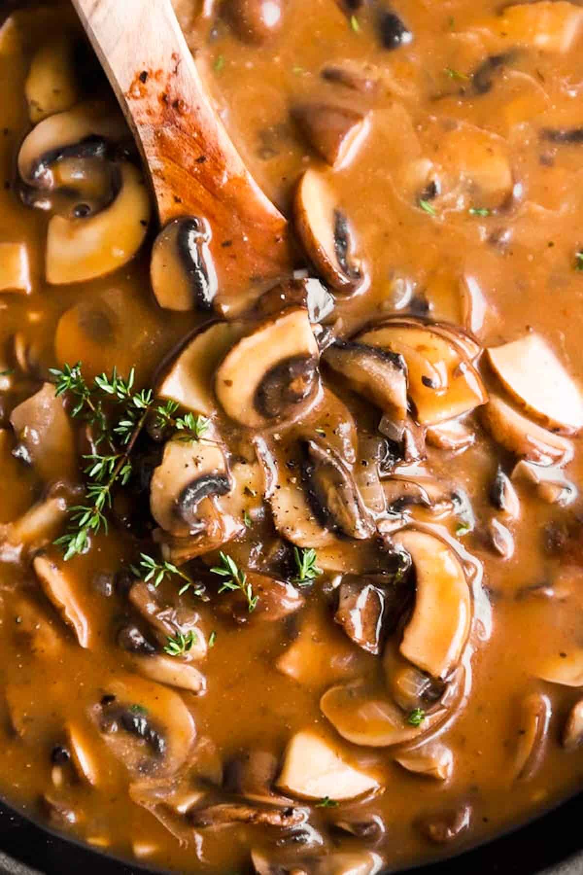 close up photo of mushroom gravy in skillet