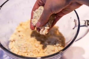 cutting butter into flour mix