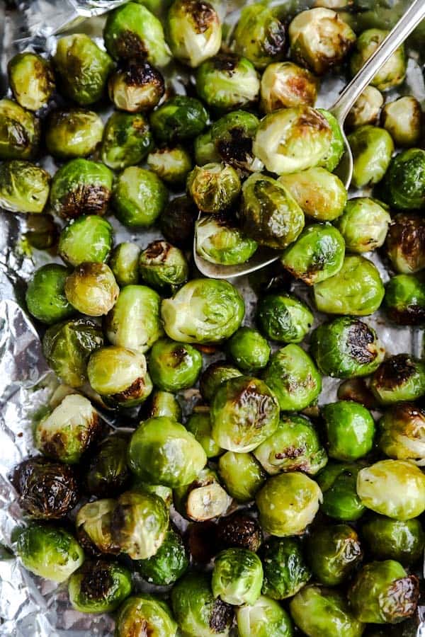 top down view of Roasted Brussels sprouts with garlic on a baking pan