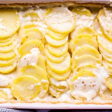 casserole dish full of scalloped potatoes