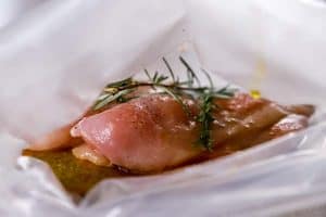 chicken in a sous vide bag with rosemary