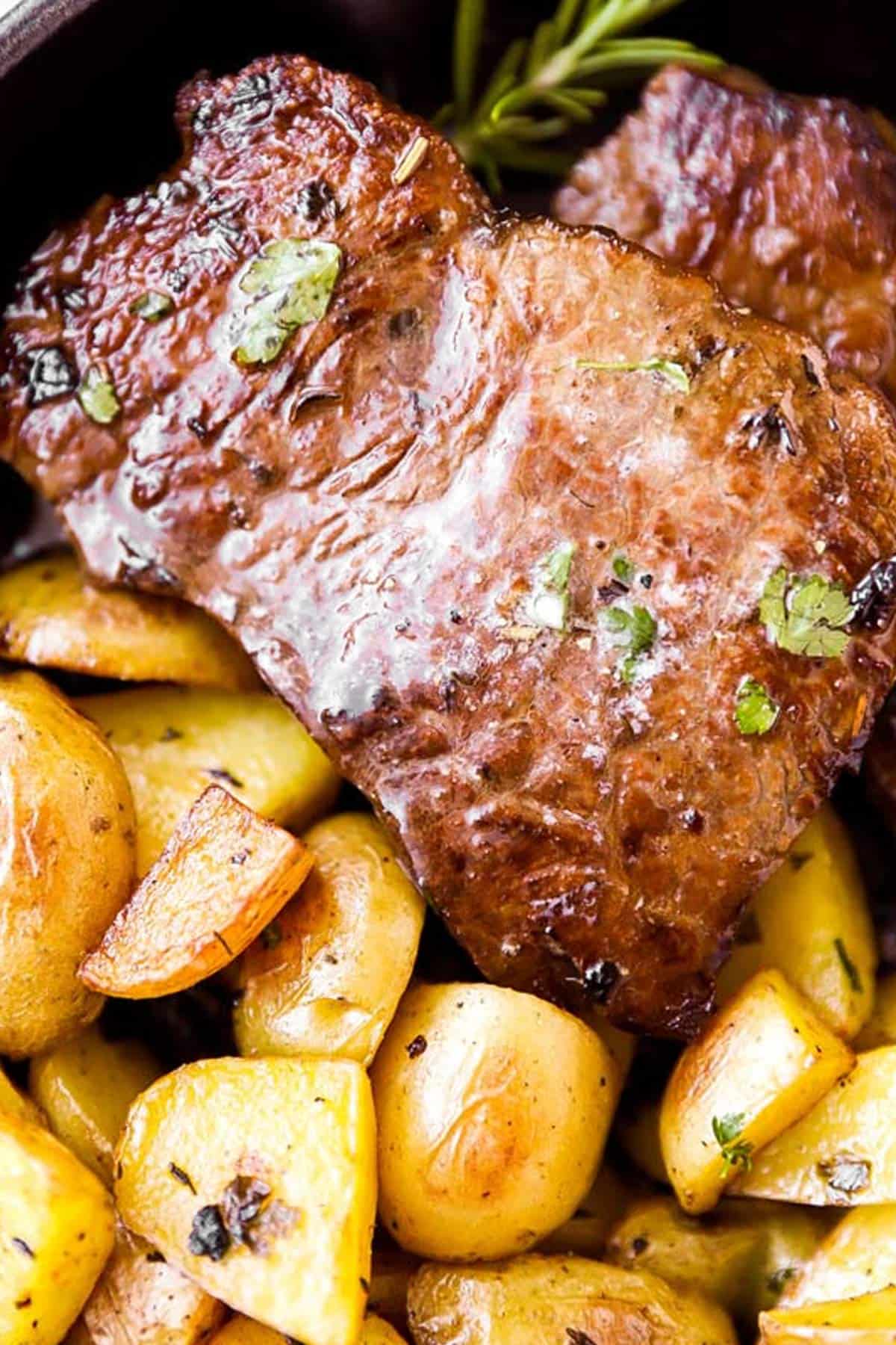 close up photo of steak and potatoes