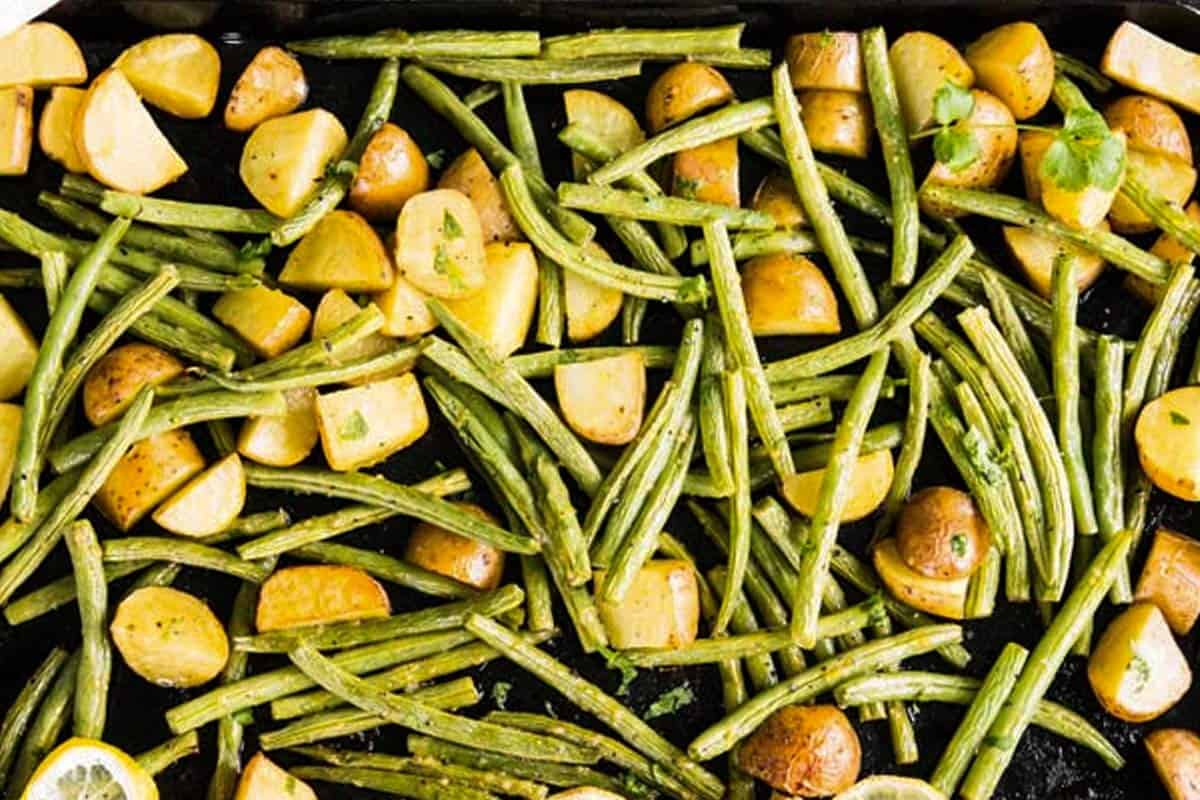 green beans and potatoes on sheet pan