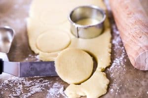 cutting out sugar cookies