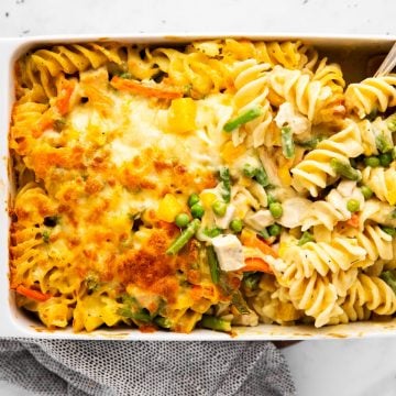 overhead view of white casserole dish with turkey noodles