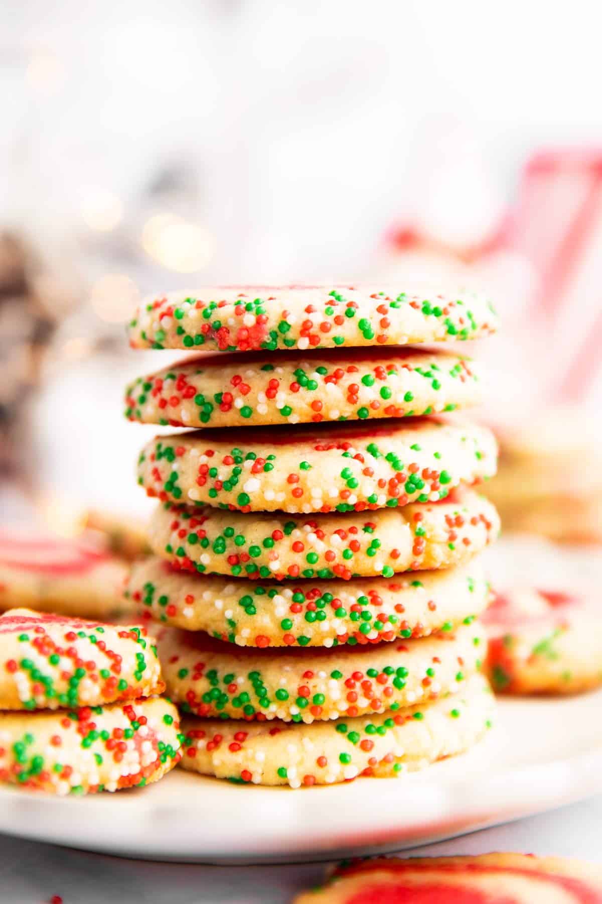 stack of Christmas Pinwheel Cookies on a white plate