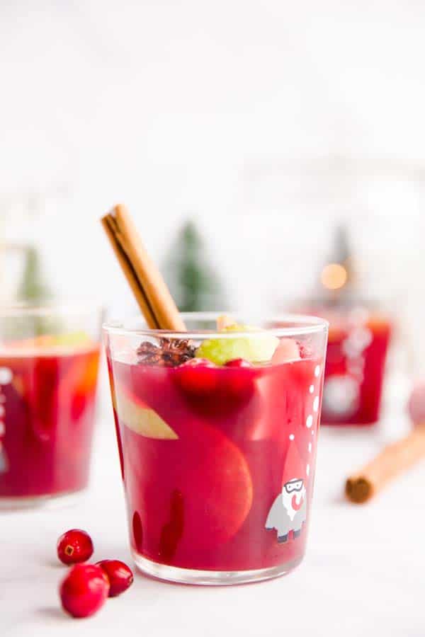 three glasses of Christmas punch on a table