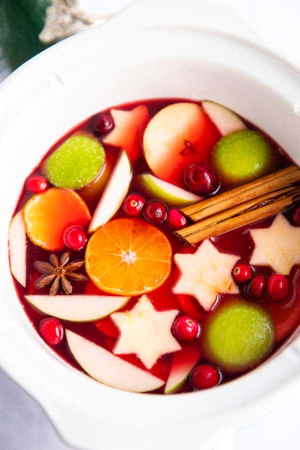close up photo of a crockpot with Christmas punch