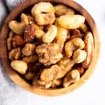 wooden bowl filled with party nuts