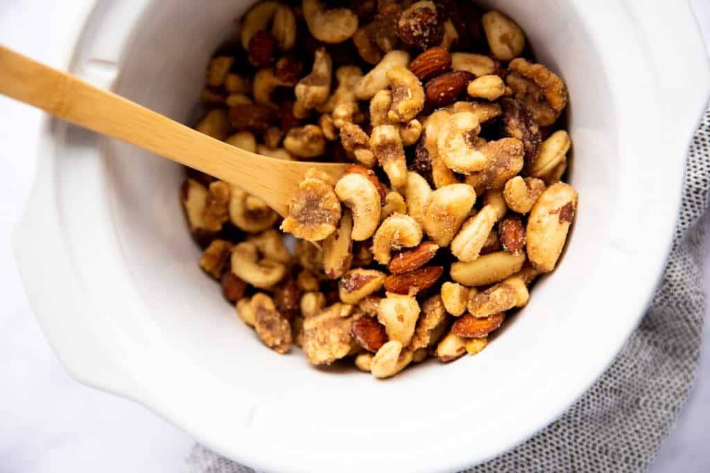 white crock filled with cinnamon nuts from the top down