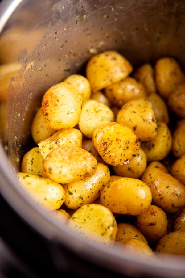 close up photo of buttery potatoes in an instant pot