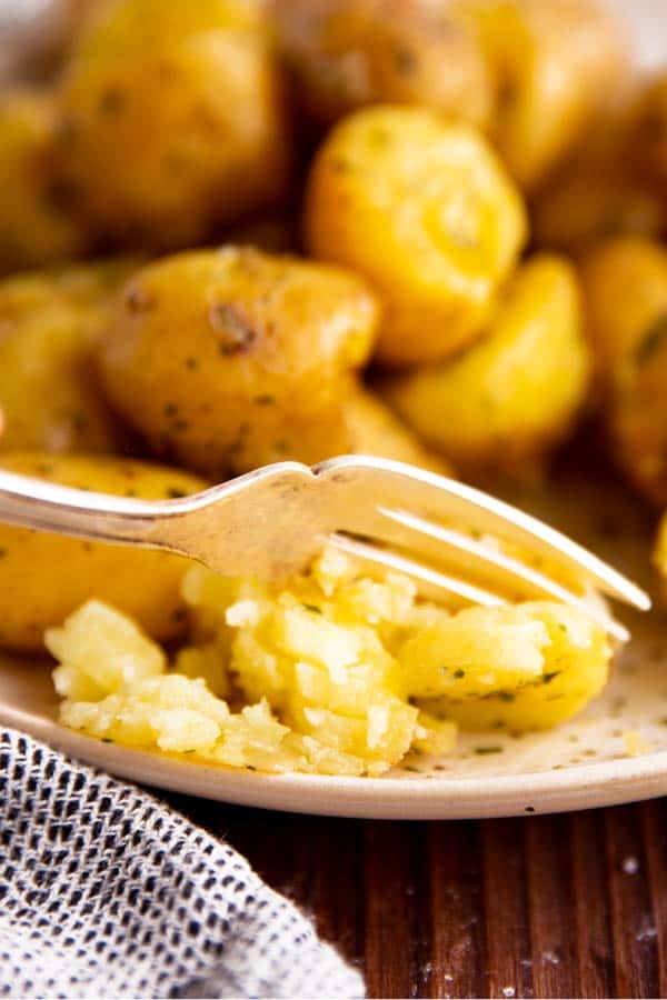 fork going through a fluffy potato