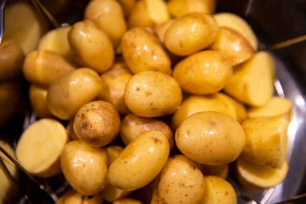 pile of raw baby potatoes in an instant pot