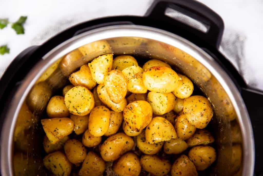 top down view of an instant pot filled with baby potatoes