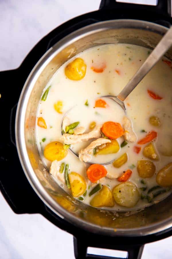 top down view of an instant pot filled with turkey rice soup