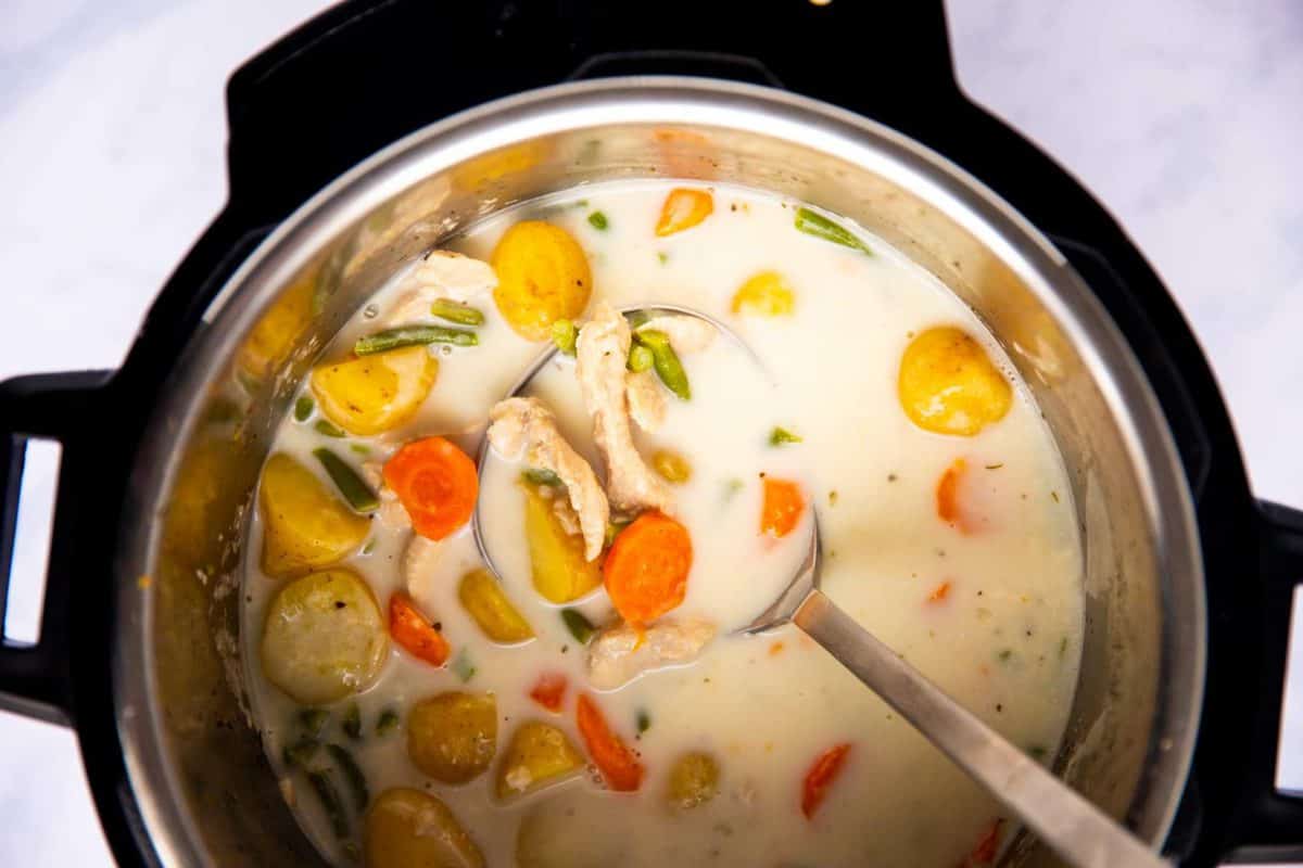 top down view of an instant pot filled with turkey rice soup