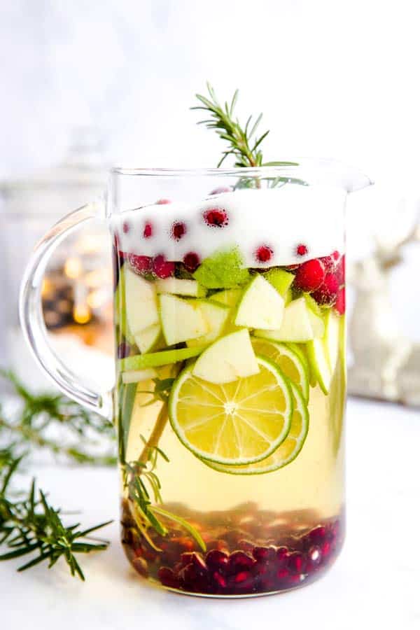 pitcher filled with white Christmas sangria