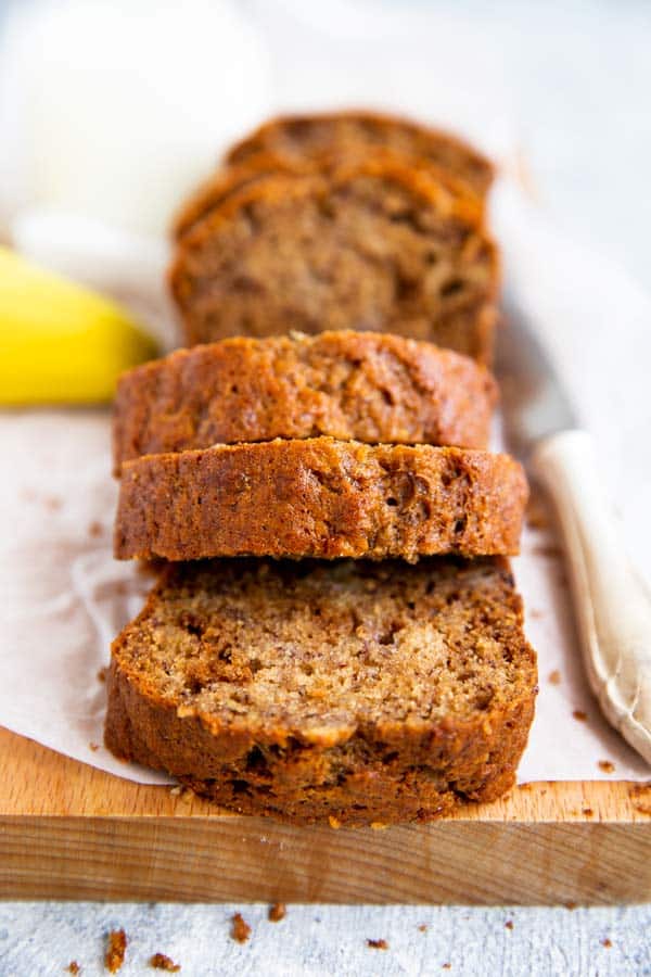 slices of banana bread on a wooden board