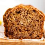 banana bread sliced on a wooden board