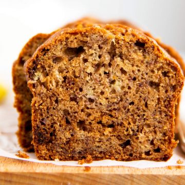 banana bread sliced on a wooden board