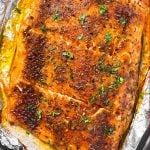 overhead view of oven baked salmon fillet cut into pieces