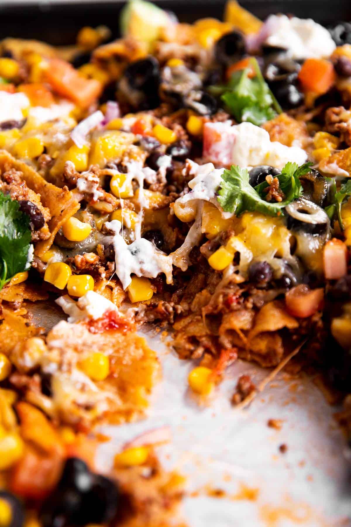 close up photo of sheet pan nachos