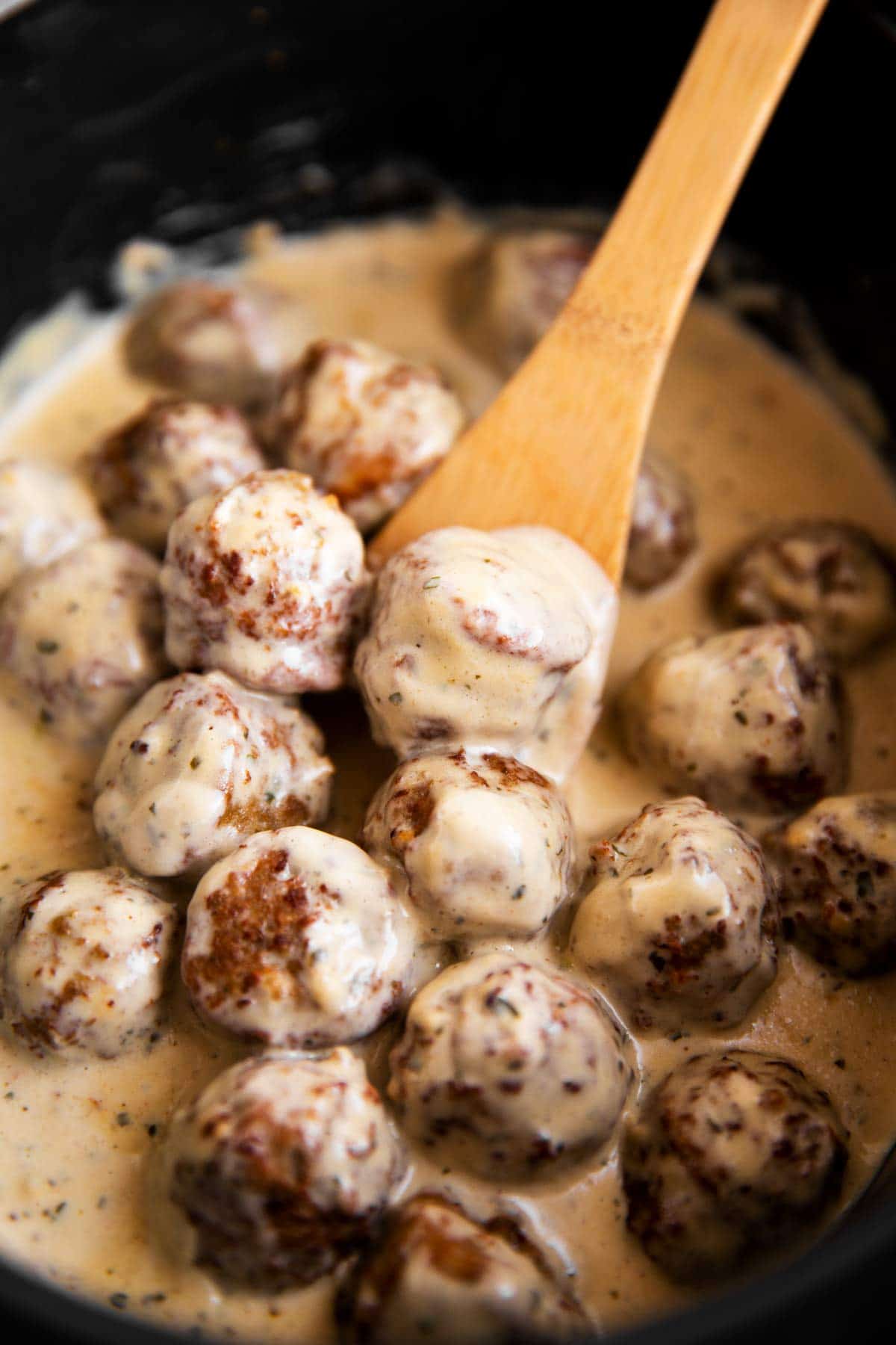 close up of Swedish meatballs in crockpot