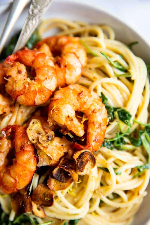 close up photo of shrimp on pasta