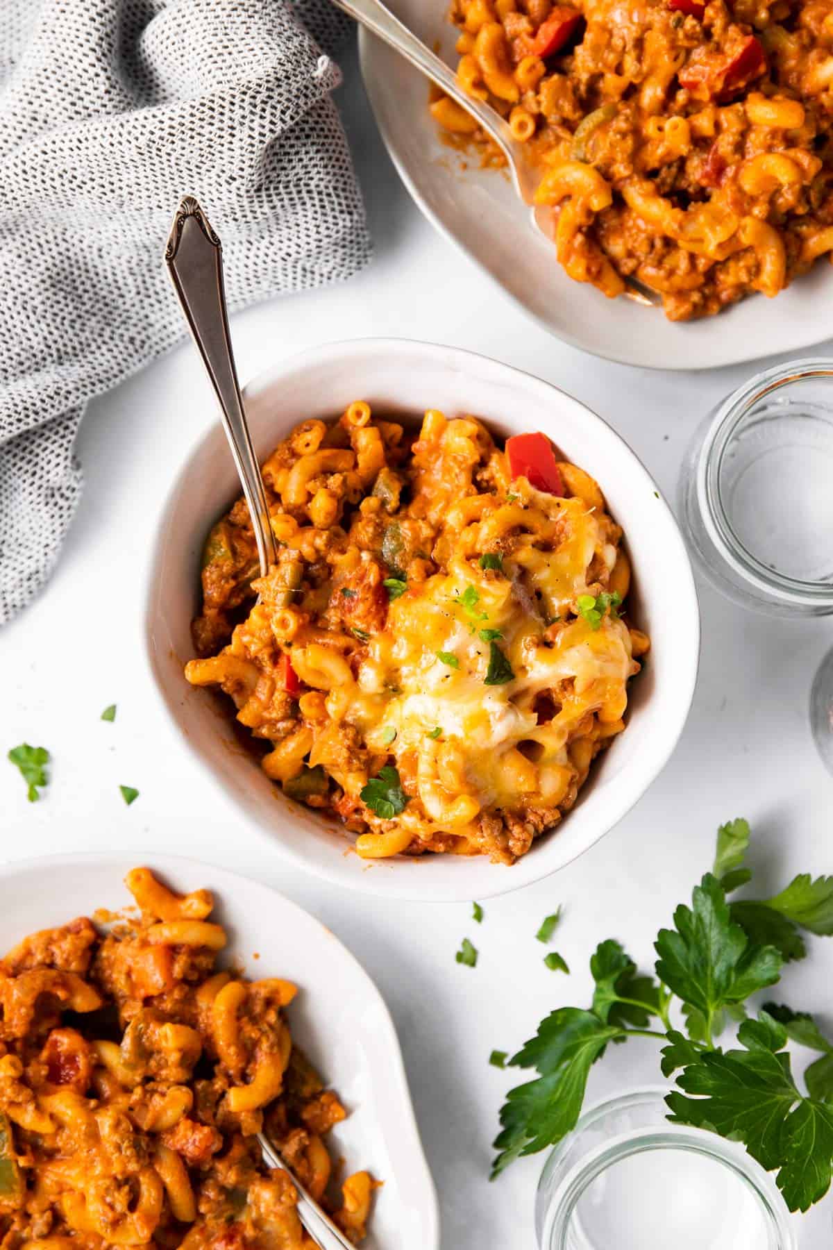 3 bowls filled with American goulash