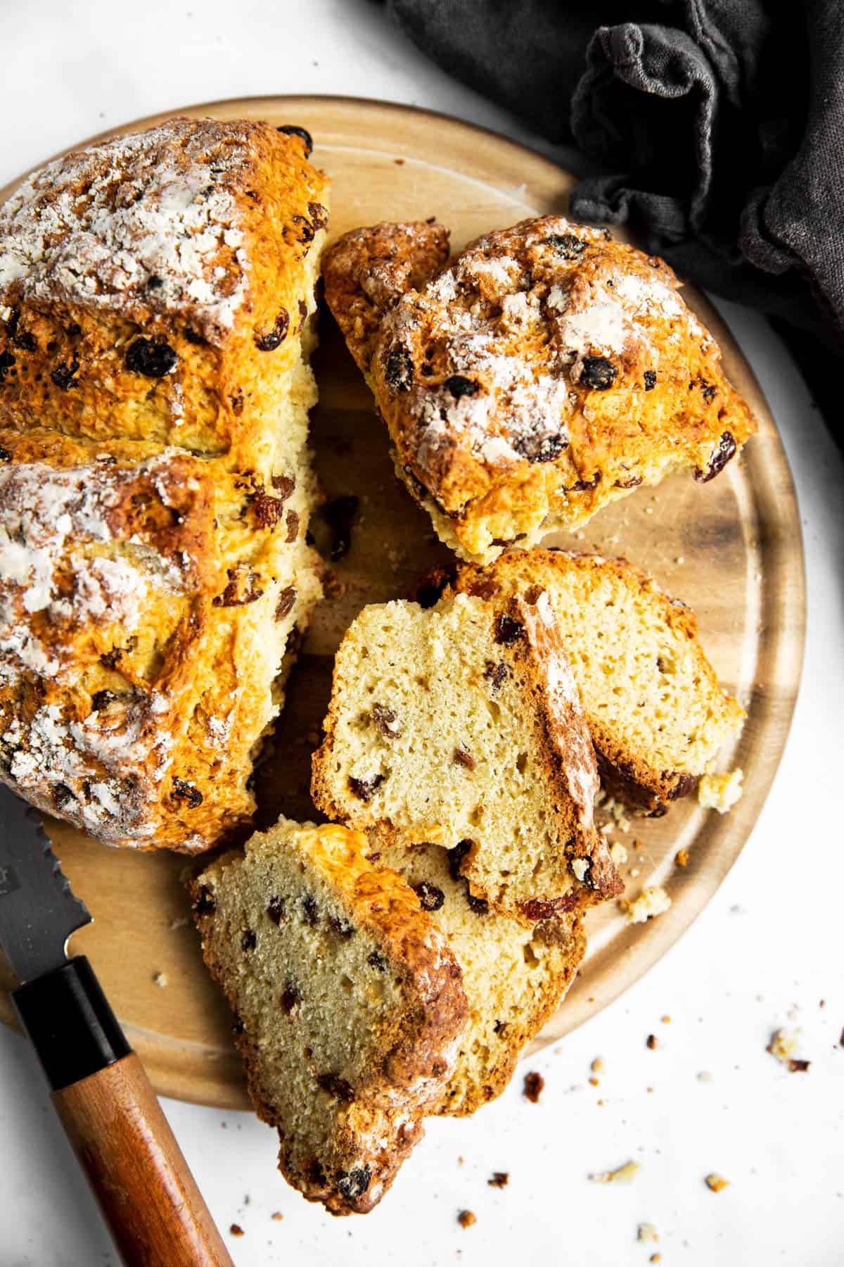 top down view of wooden board with sliced Irish soda bread