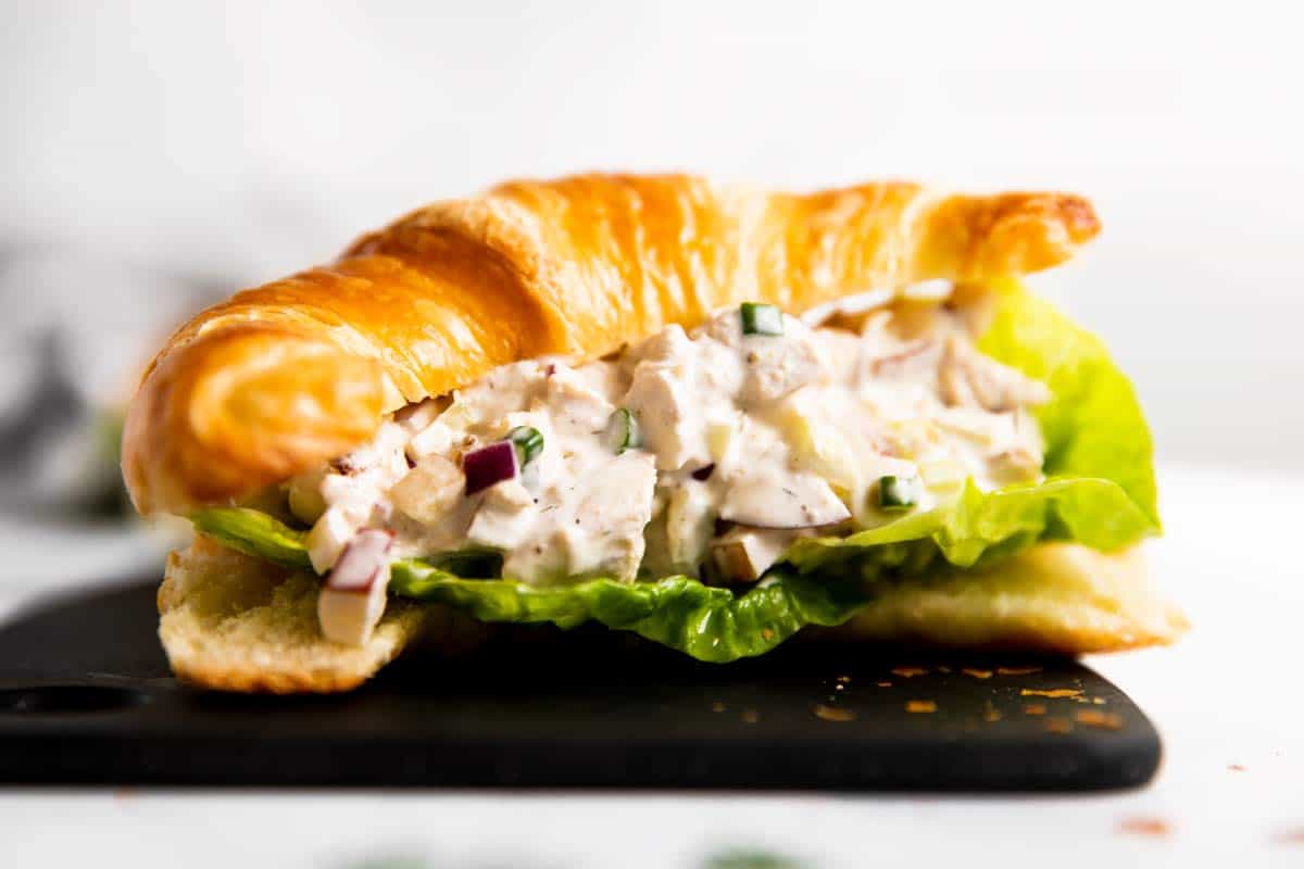 frontal view of croissant filled with chicken salad