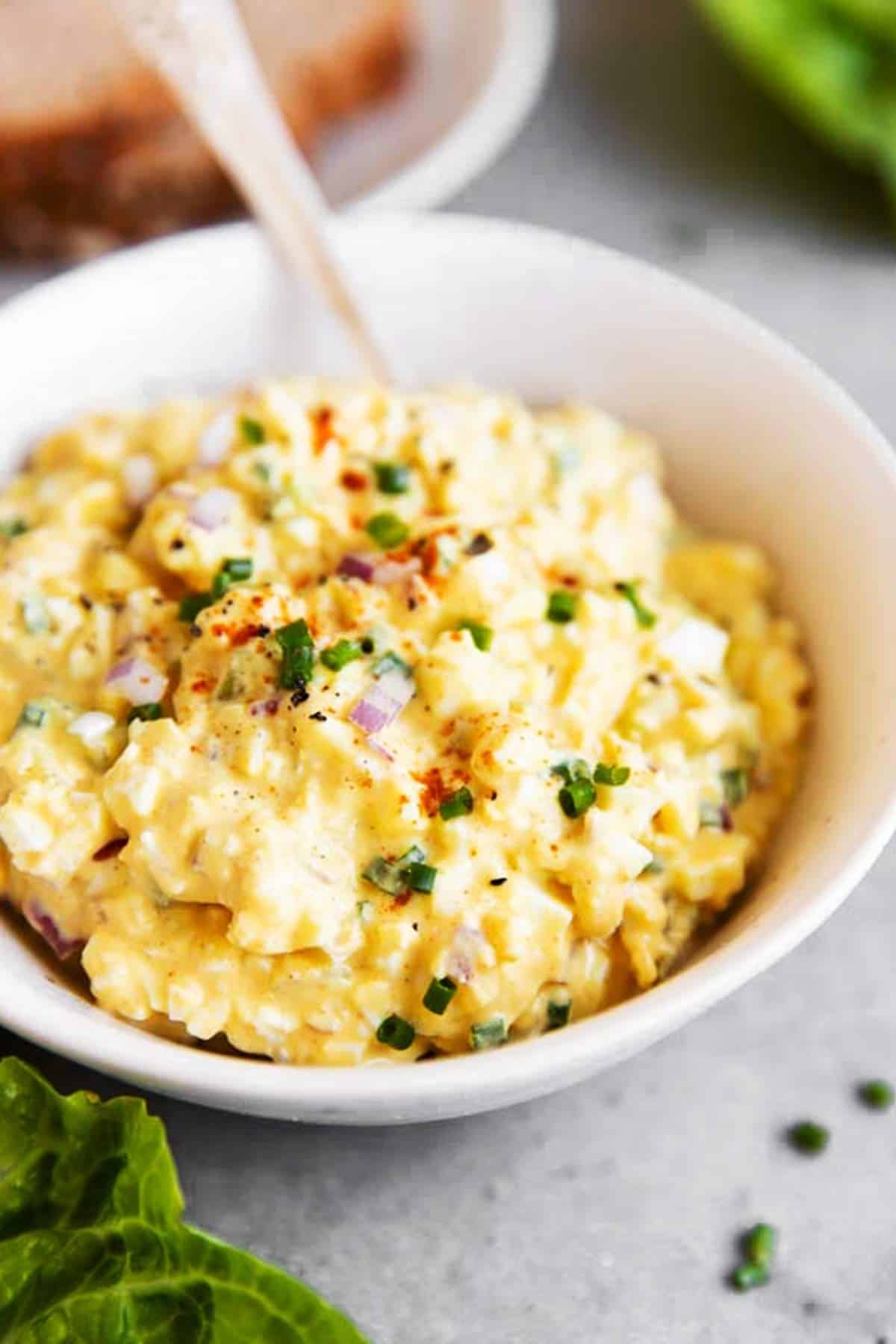 close up photo of a bowl with egg salad