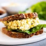 greek yogurt egg salad sandwich on a platter