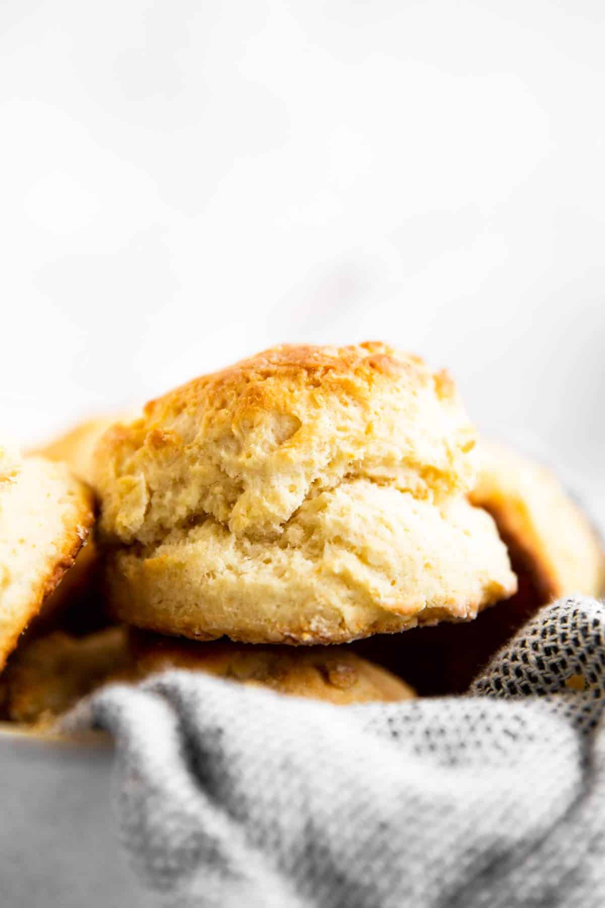 close up photo of a biscuit in a basket