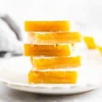 stack of lemon bars on a plate