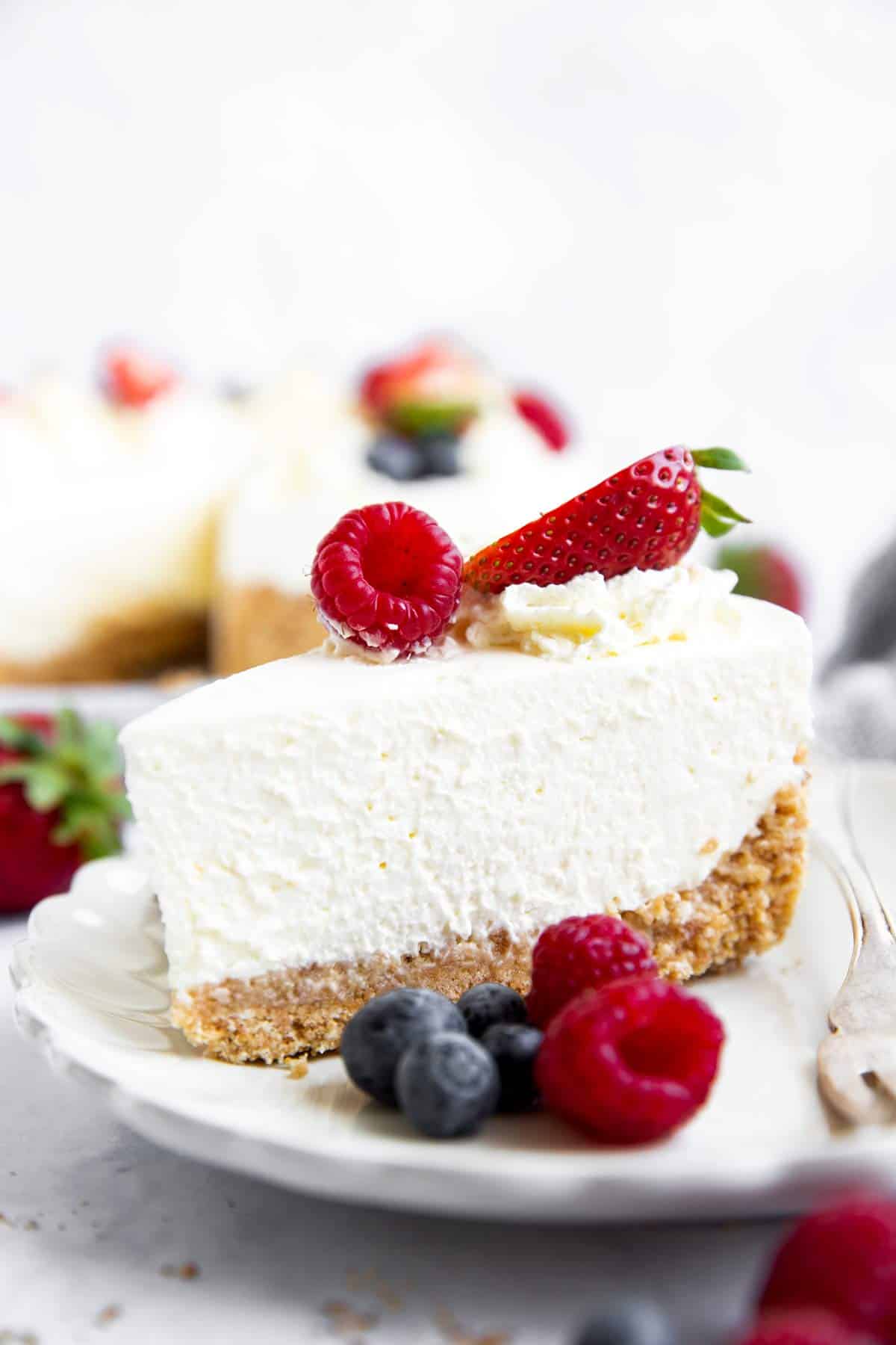 slice of no bake cheesecake with berries