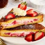 Stack of Strawberry Cream Cheese Stuffed French Toast slices.