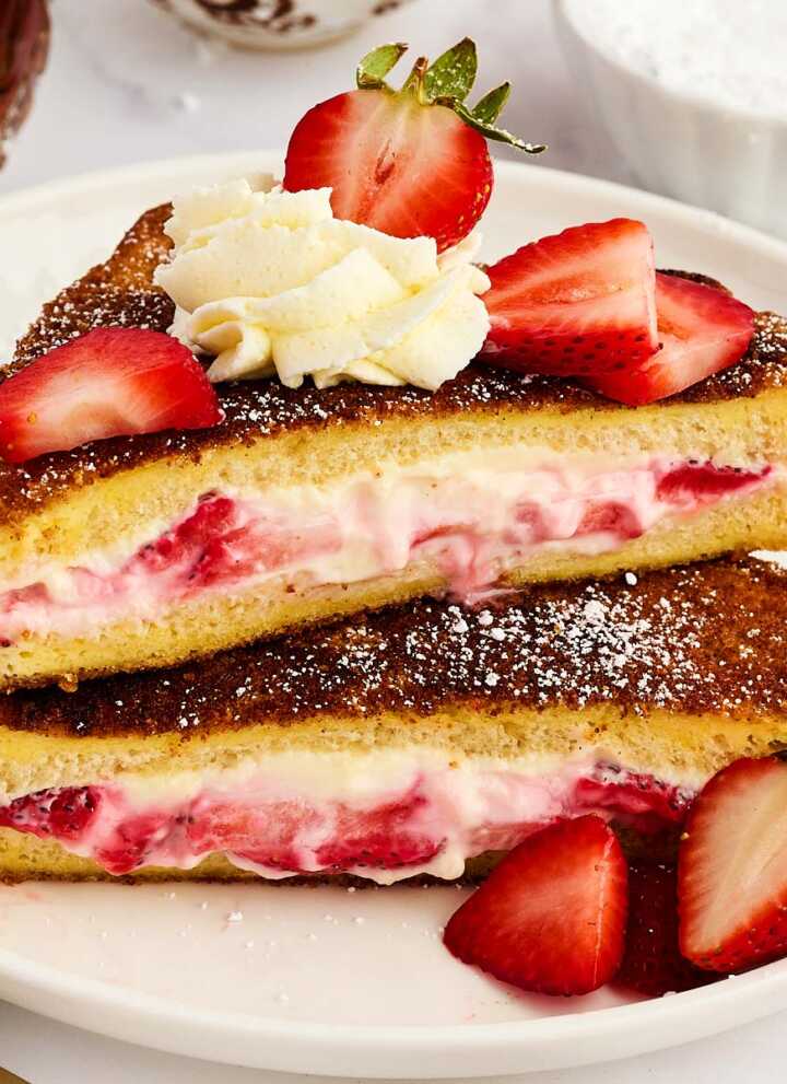 Stack of Strawberry Cream Cheese Stuffed French Toast slices.