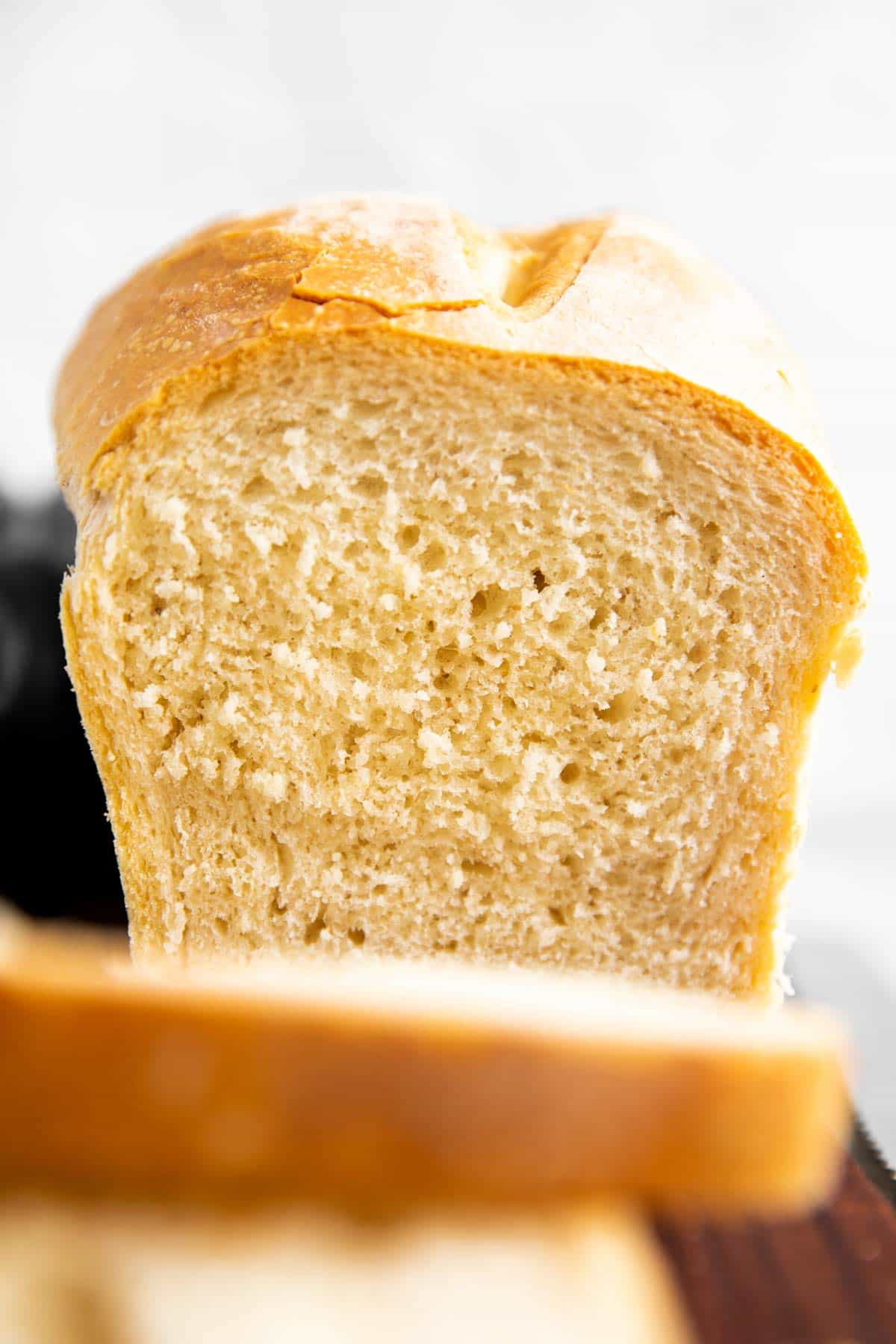 frontal view on sliced loaf of bread
