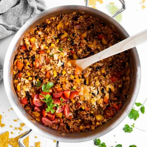 top down view on a skillet filled with beef and rice