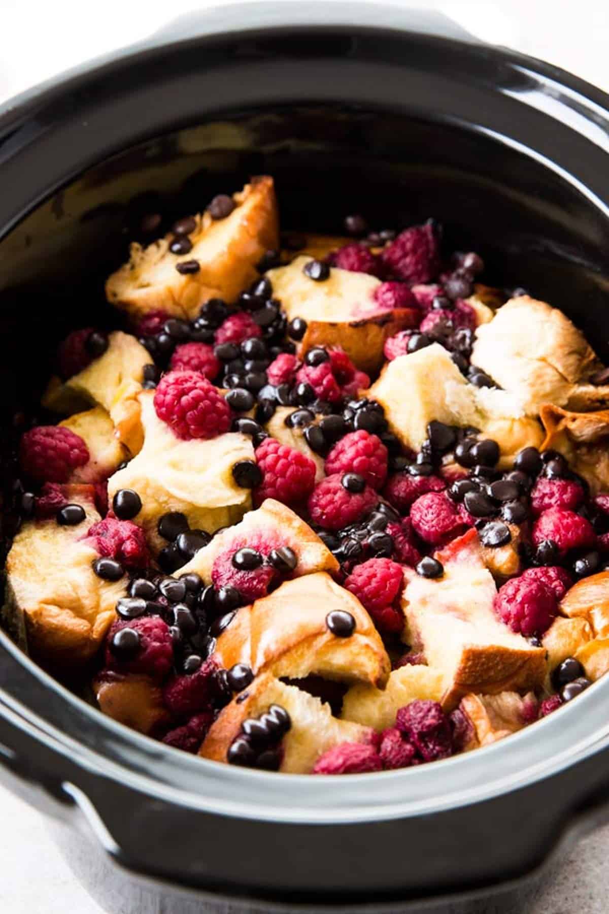 close up photo of raspberry French toast in crockpot