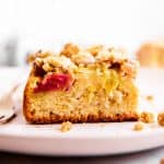 frontal view of rhubarb coffee cake slice on plate