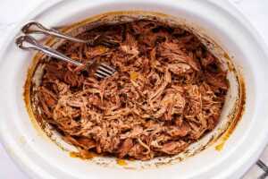 Shredded pork in slow cooker.