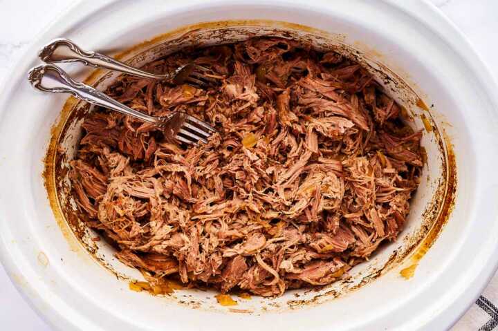 Shredded pork in slow cooker.