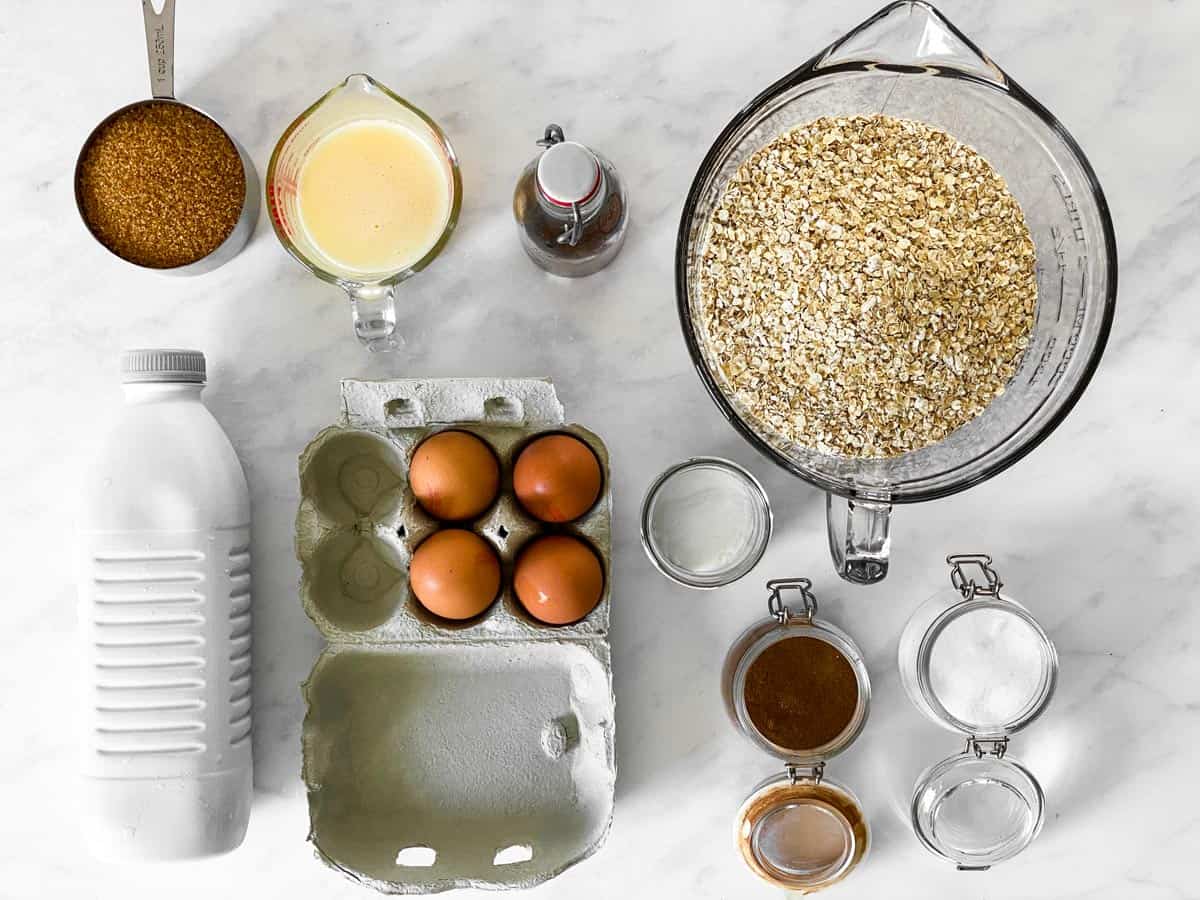 ingredients for baked oatmeal on a marble surface