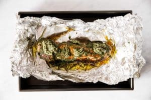 baked pork tenderloin with garlic butter in foil