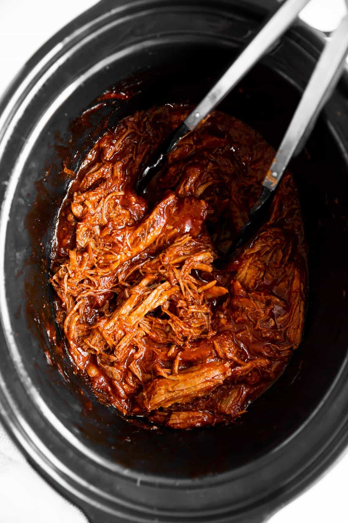 overhead view of crockpot with BBQ pulled pork