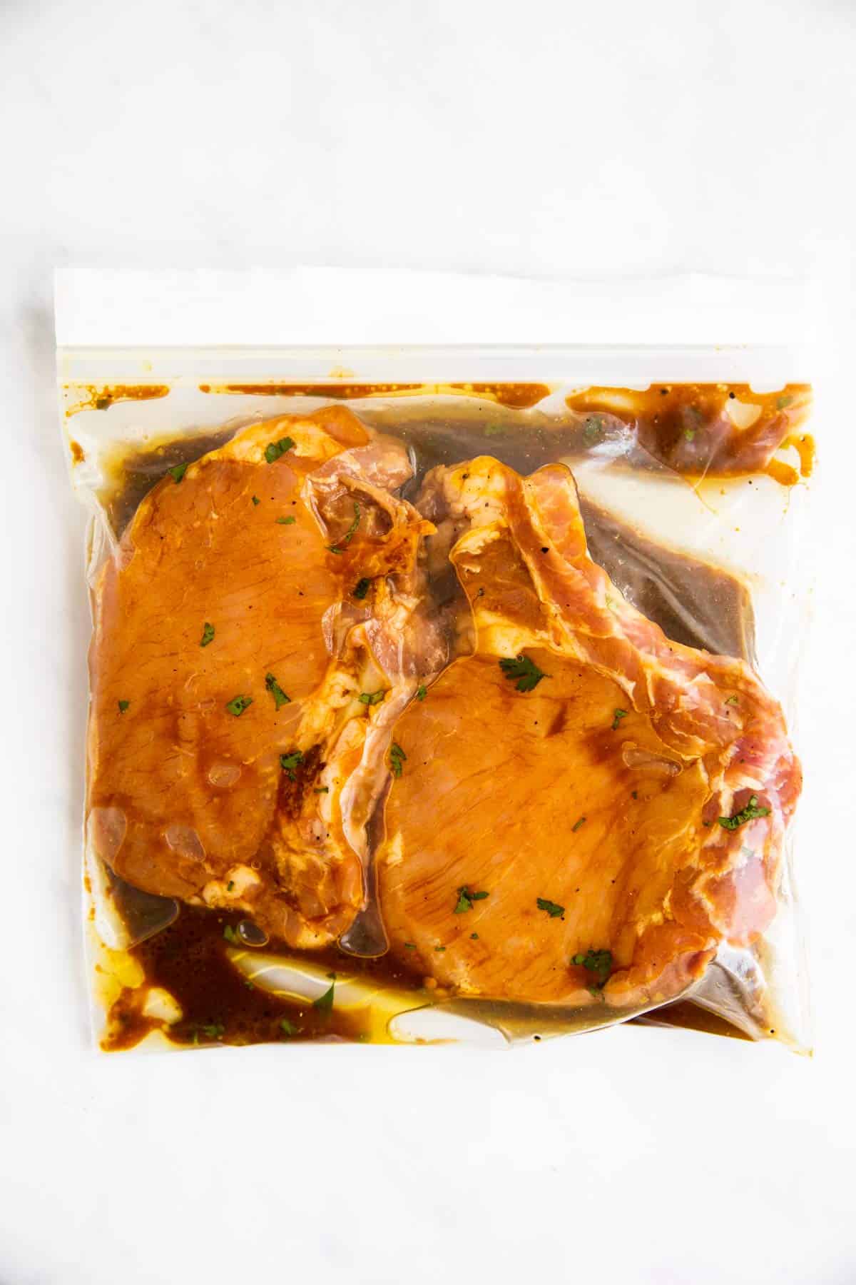 ziploc bag with marinated pork chops